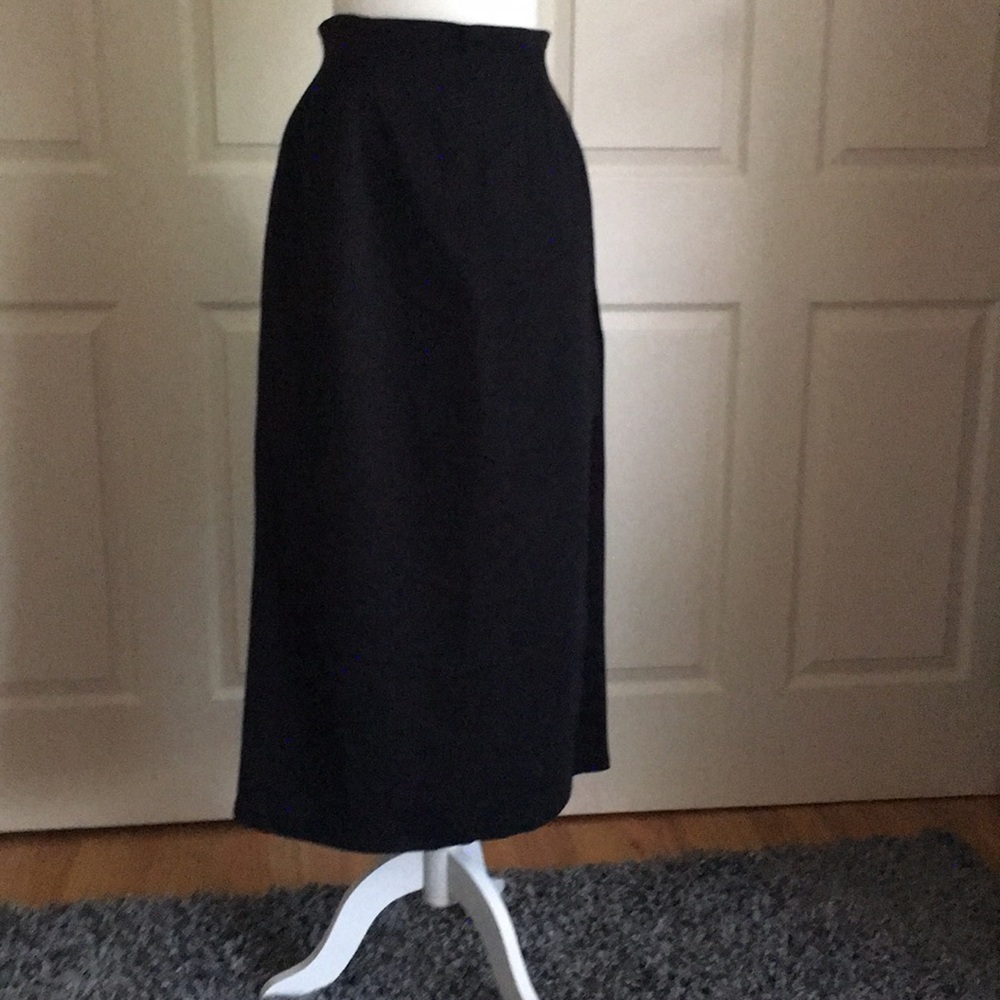 Long pencil skirt, suede- like material with slit.